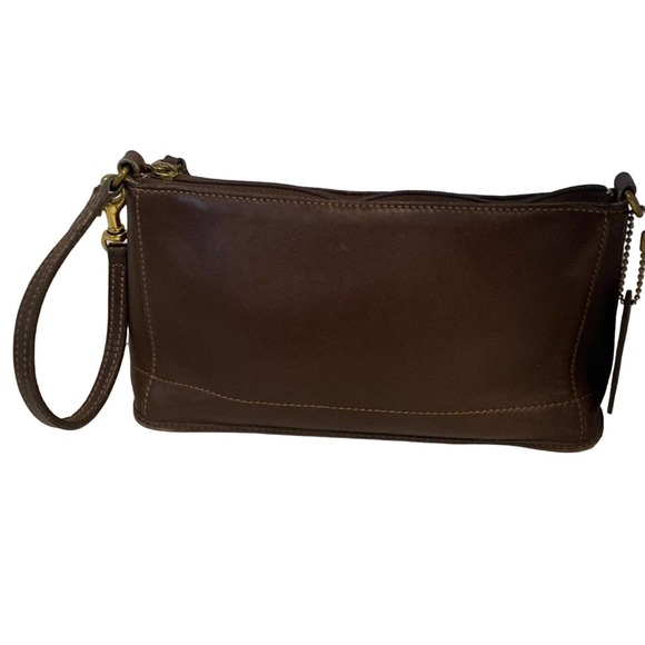 Coach Handbags - Coach Wristlet great condition no flaws seen no smells etc see pics 8” wide 5”H